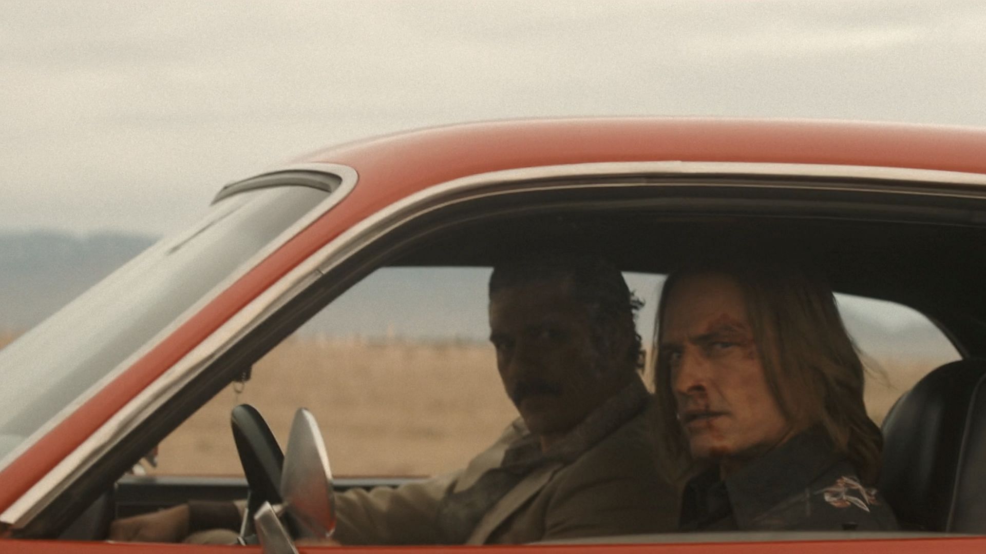 Jim and Enrique during the car chase (Image via Max)